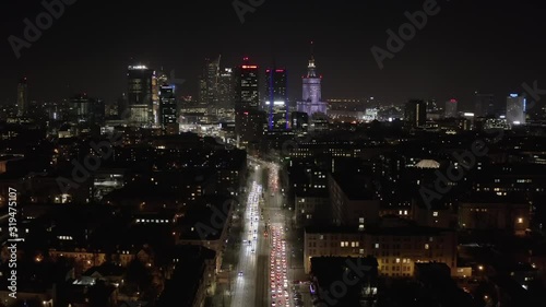 Wallpaper Mural Aerial view of the cityscape with skyscrapers and infrastructure in the business center of Warsaw, at sunset at dusk. Poland. 05. February. 2020. Drone view of skyscrapers at dusk and city traffic. Torontodigital.ca
