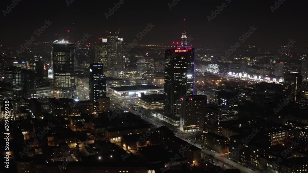 Warsaw, Poland. 05. February. 2020. Aerial view of the cityscape with skyscrapers and infrastructure in the business center of Warsaw, at sunset at dusk. Warsaw, Poland. 05. February. 2020. Aerial view of the cityscape with skyscrapers and infrastructure in the business center of Warsaw, at sunset at dusk.