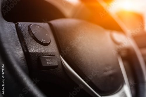Fototapet The button in steering wheel in car.