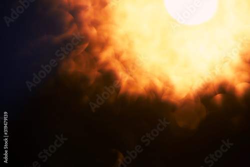 Abstract photo of orange bokeh with glowing light on backdrop photo