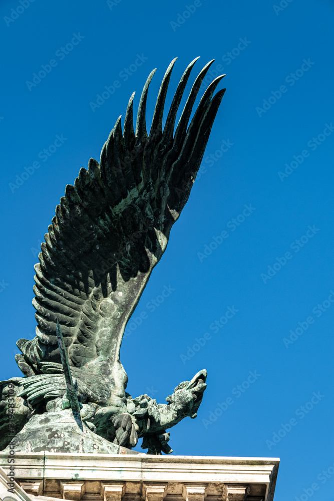 Famous Turul bird sastue near the Royal Castle, Budapest, Hungary. Turul is a mythological bird of prey and a national symbol of Hungarians.