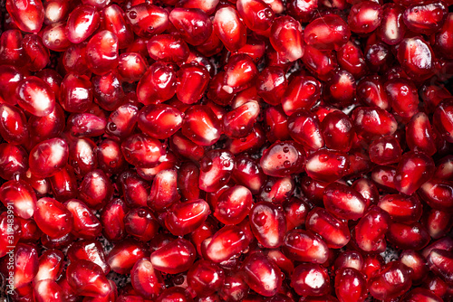 Pomegranate seeds in overhead view. Close up view.