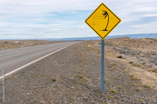 Road sign warning of strong wind in Patagonia photo