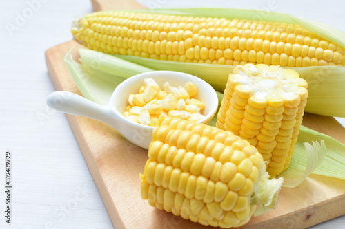  fresh organic corn in leaf, shelled and in pieces