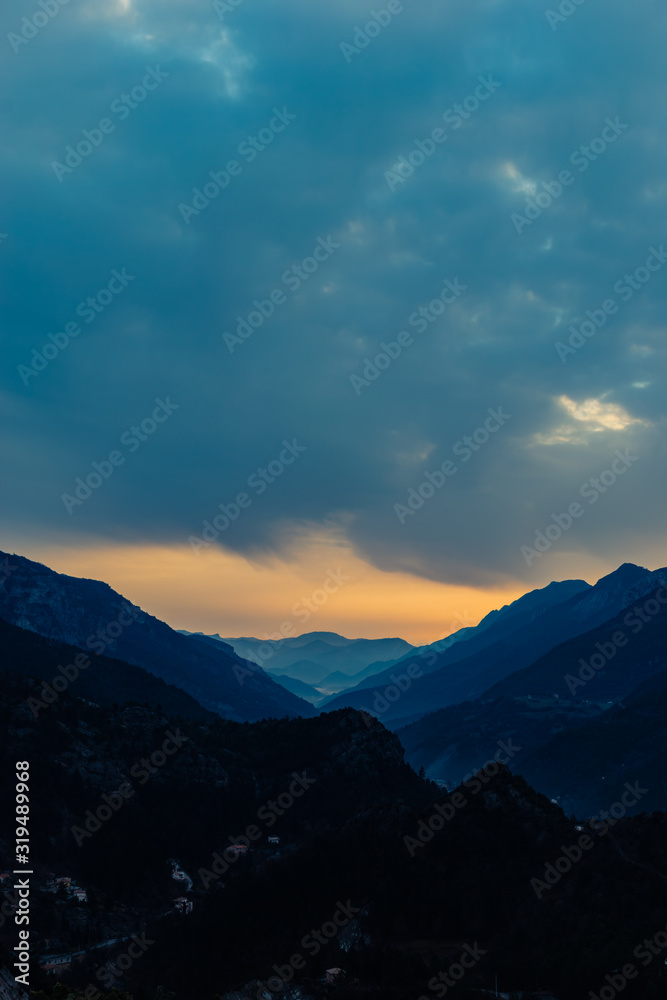 The sunrise in the French Alps mountains during a hike 