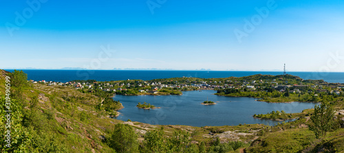 Sorvagen Lofoten Norway Beautiful Norwegian landscape, Wide panoramic view of the lake Sorvagvatnet and fishing town Sorvagen on the tip of Lofoten and also the start of Hike Towards Munken trail.