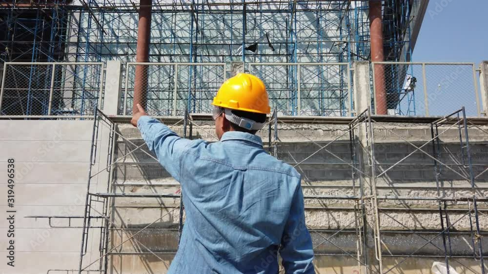 asian male engineer or foreman working at construction site or building site of asian male engineer or foreman working at construction site or building site of