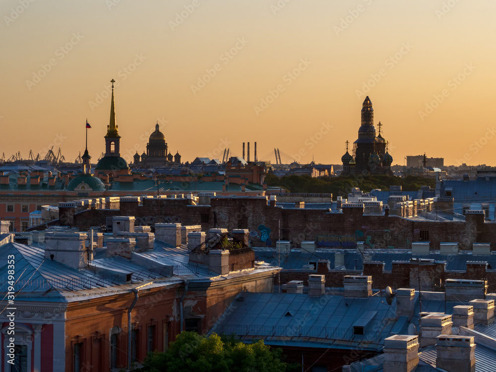 Fototapeta premium City at sunset. Beautiful evening picturesque summer panorama of St. Petersburg, Russia