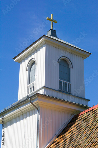 Church tower with Cross in Sweden old Town.