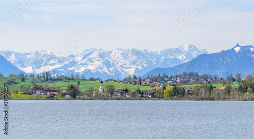 Riegsee mit Blick auf Murnau und die bayrischen Alpen im Frühling photo