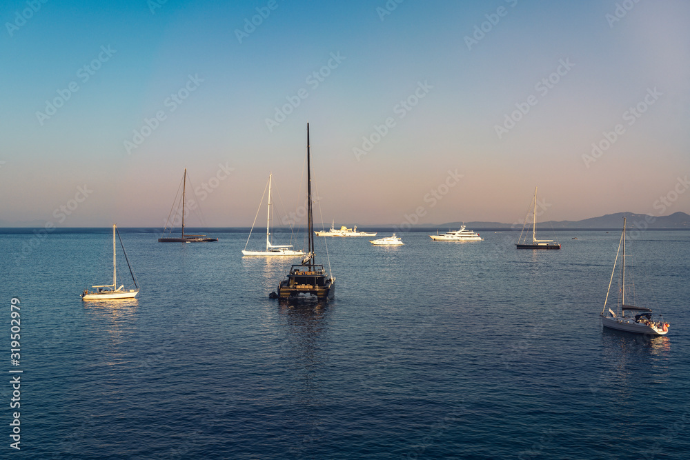 some luxury yachts anchor off corfu