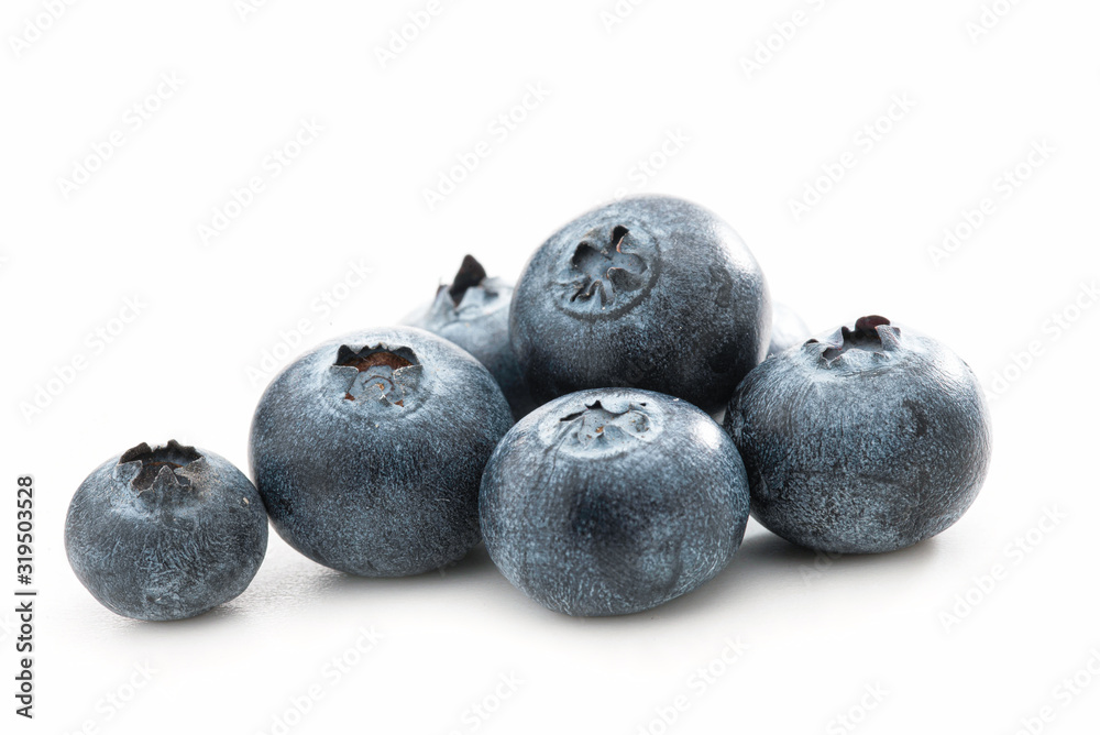 Blueberries isolated against white - macro shot Blueberries isolated against white - macro shot
