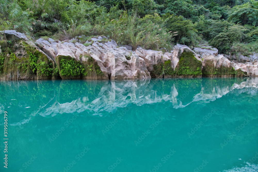 Amazing crystalline blue water of Tamul waterfall, Close up view of spectacular Tamul River,at Huasteca Potosina in San Luis Potosi, Mexico Amazing crystalline blue water of Tamul waterfall, Close up view of spectacular Tamul River,at Huasteca Potosina in San Luis Potosi, Mexico