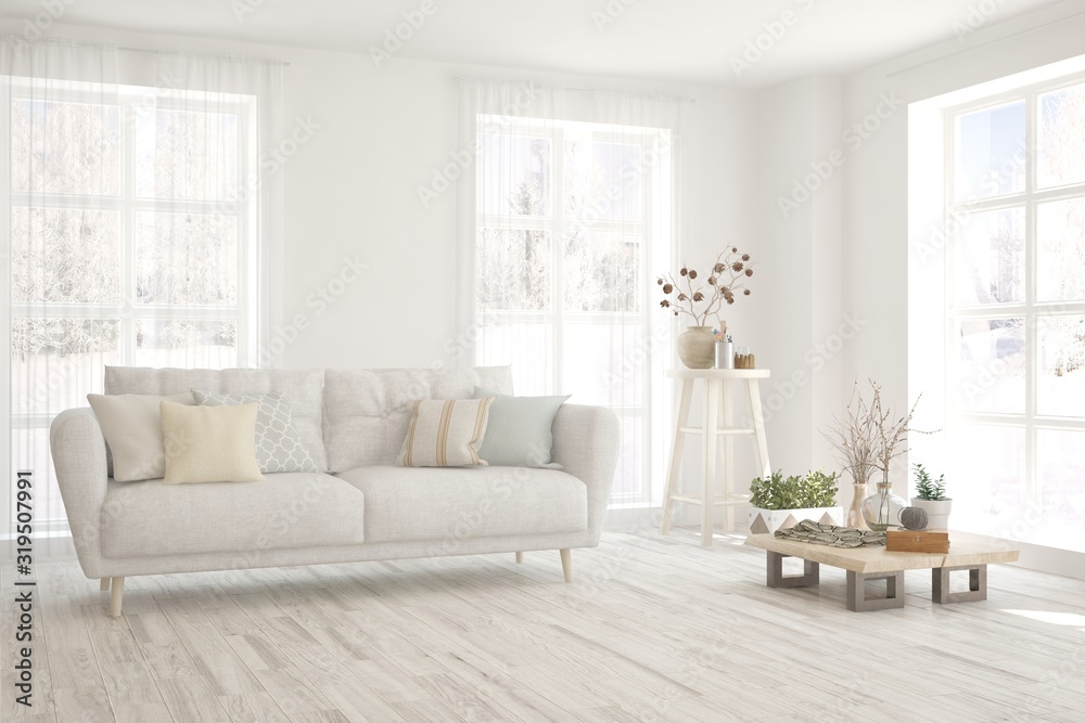 Fototapeta premium Stylish room in white color with sofa and winter landscape in window. Scandinavian interior design. 3D illustration