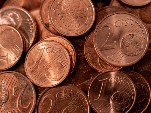 Image full of Euro cents, copper coin, one and two cents coin will be dismissed by ECB photo
