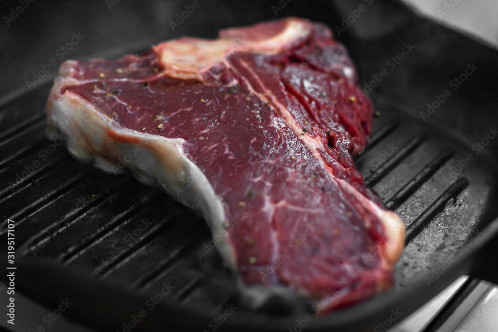 close up beef steak roasted on grill pan