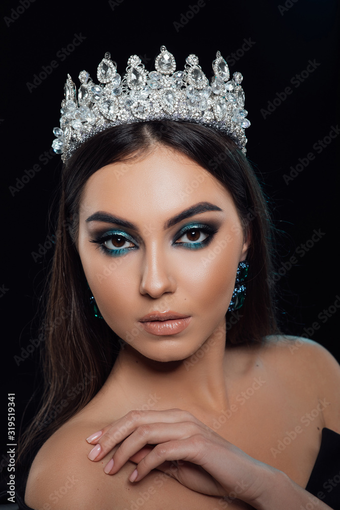 High Fashion model woman posing in studio, beautiful sexy girl with trendy make-up and manicure. Art design, colorful make up. Smooth hairstyle with crown. Highlighting. Cosmetology, Beauty and Spa High Fashion model woman posing in studio, beautiful sexy girl with trendy make-up and manicure. Art design, colorful make up. Smooth hairstyle with crown. Highlighting. Cosmetology, Beauty and Spa