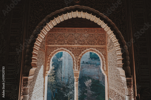 Alhambra Nazari palace with Muslim art decoration photo