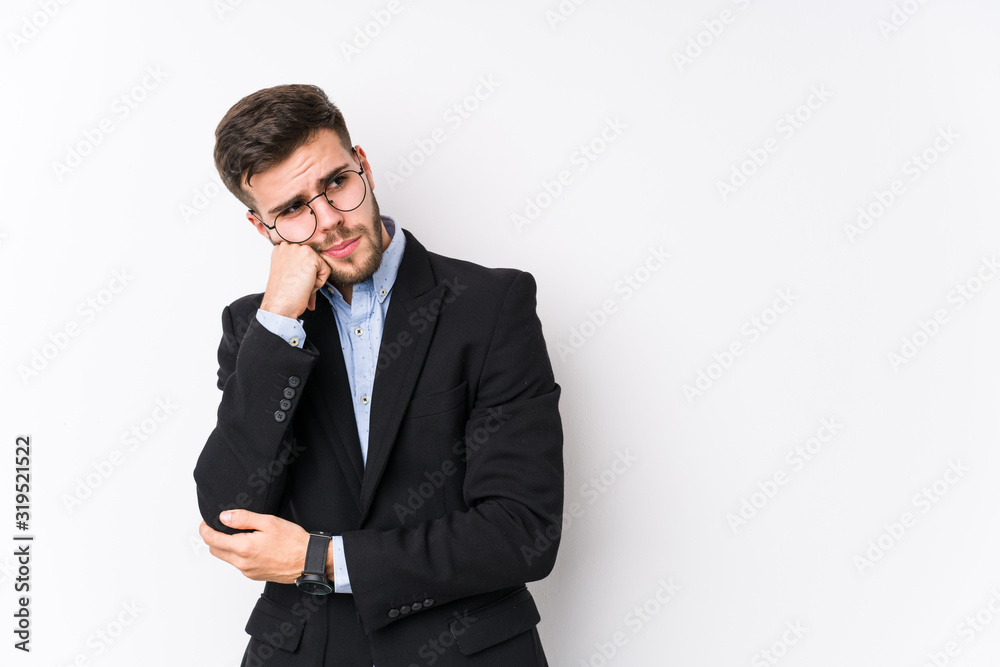 Young caucasian business man posing in a white background isolated Young caucasian business man who feels sad and pensive, looking at copy space. Young caucasian business man posing in a white background isolated Young caucasian business man who feels sad and pensive, looking at copy space.