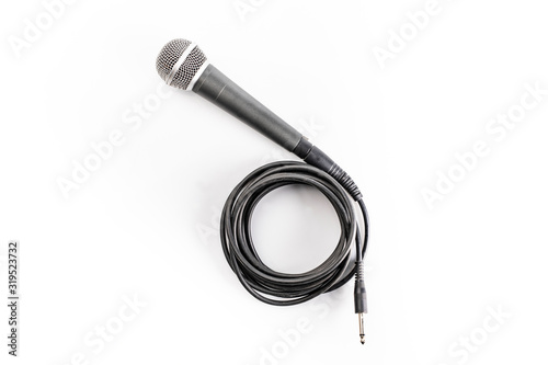 Wired microphone with jack connector, isolated on white, top view.