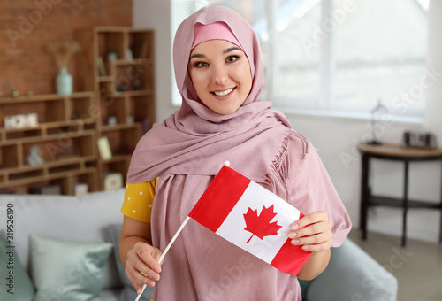 Young Muslim woman with Can...