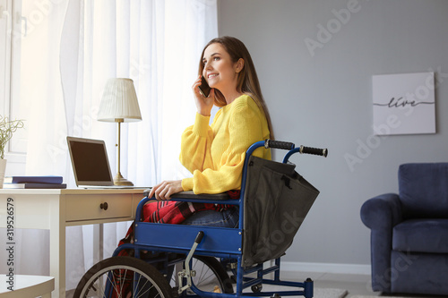 Handicapped young woman in ...