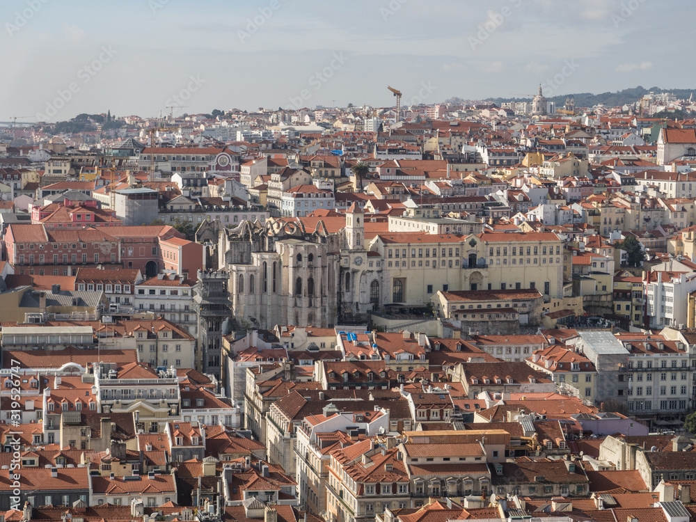 Aerial view of  Lisbon with Convent of Our Lady of Mount Carmel (Portuguese: Convento da Ordem do Carmo) and Santa Justa elevator in Portugal...
