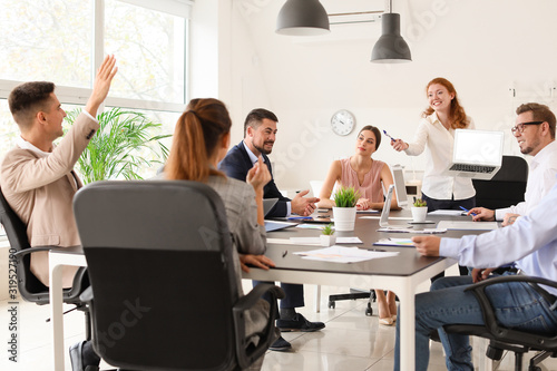 Group of business people during meeting in office