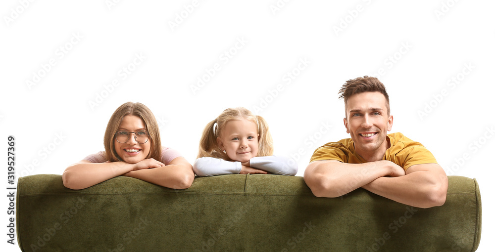 Naklejka premium Happy young family sitting on sofa against white background