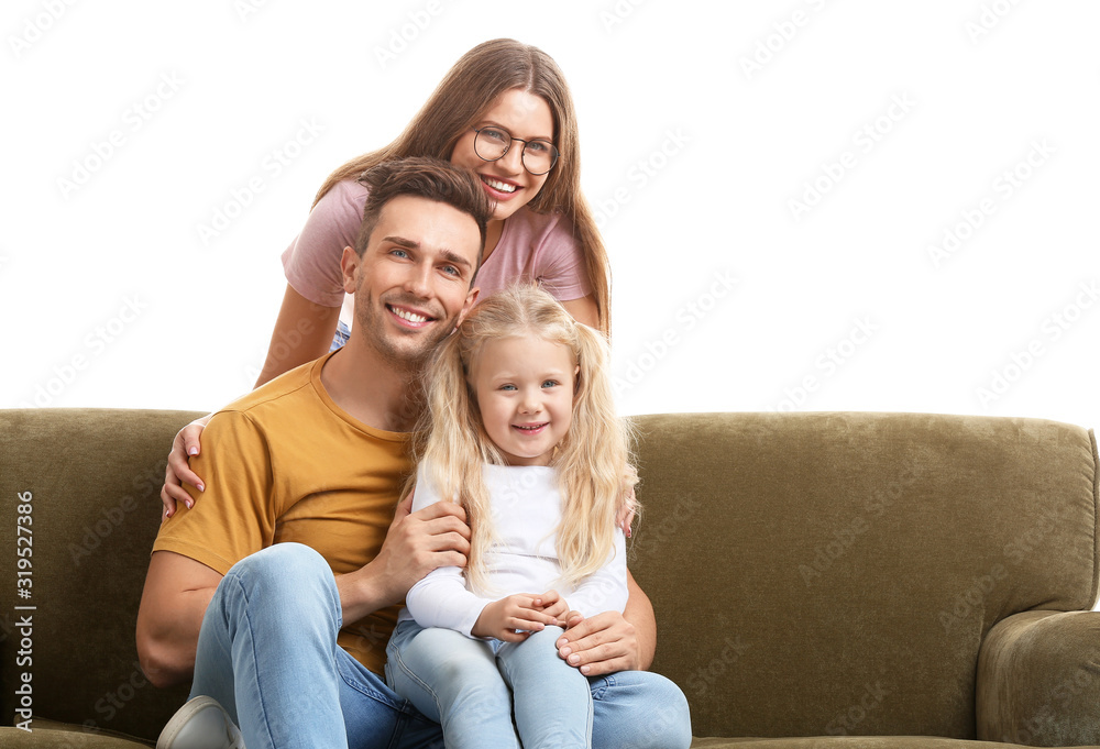 Happy young family sitting with sofa on white background