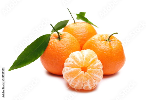 Tangerine with pieces isolated on white background