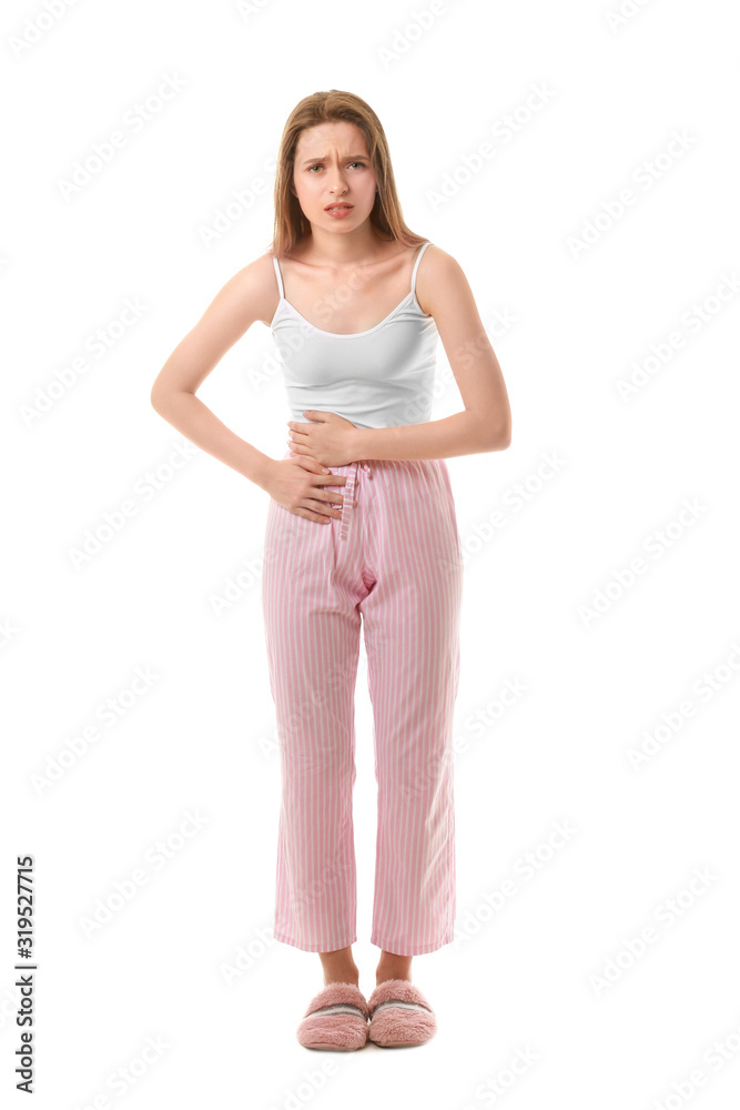 Young woman suffering from abdominal pain on white background Young woman suffering from abdominal pain on white background