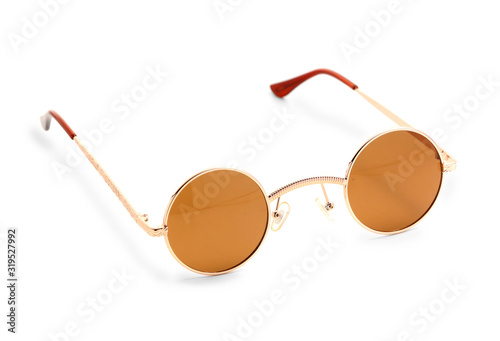 Stylish sunglasses on white background