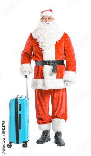 Santa Claus standing with b...