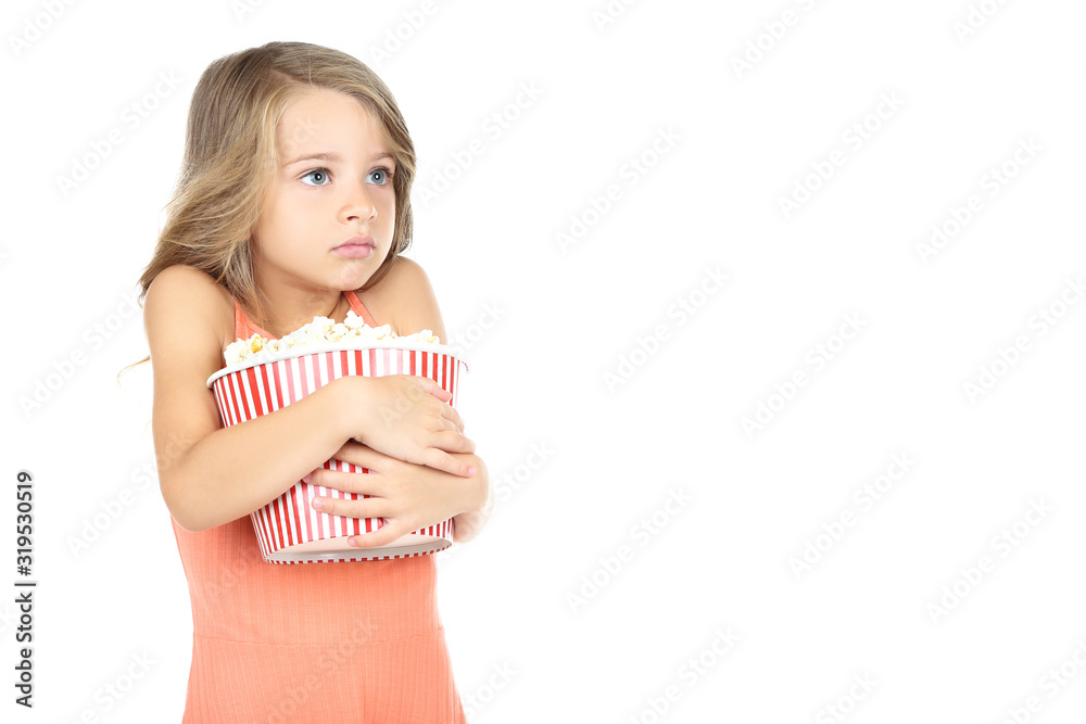 Young girl holding bucket with popcorn on white background Young girl holding bucket with popcorn on white background