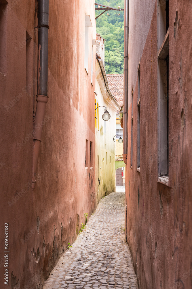 Rope Street in downtown Brasov, Romania. Rope street is one of the narrowest street in Europe. Rope Street in downtown Brasov, Romania. Rope street is one of the narrowest street in Europe.