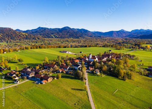 Germany, Bavaria, Wackersberg, Aerial view of countryside village in autumn photo