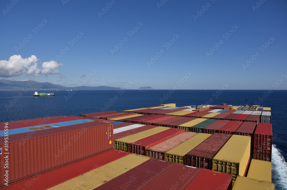 Containers loaded on the cargo ship, she is sailing between Gibraltar and Moroccan coast. 