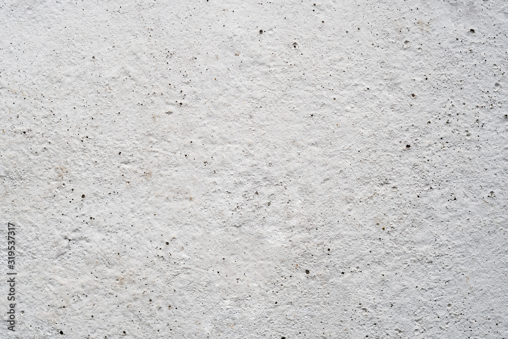 Fototapeta premium White concrete wall. Porous texture.