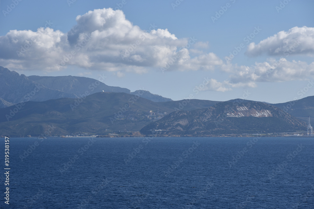 Landscape of Moroccan coast near Tangier. View from the sailing vessel. Landscape of Moroccan coast near Tangier. View from the sailing vessel.