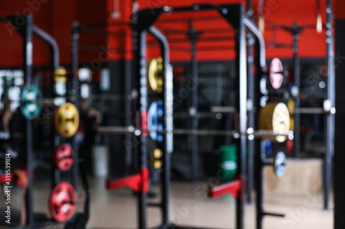 Blurred view of gym with modern equipment