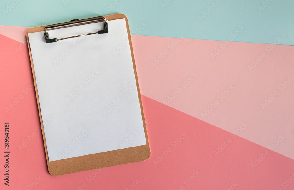 Mock-up clipboard with white paper sheet on colorful background. Business, notes and office concept Mock-up clipboard with white paper sheet on colorful background. Business, notes and office concept