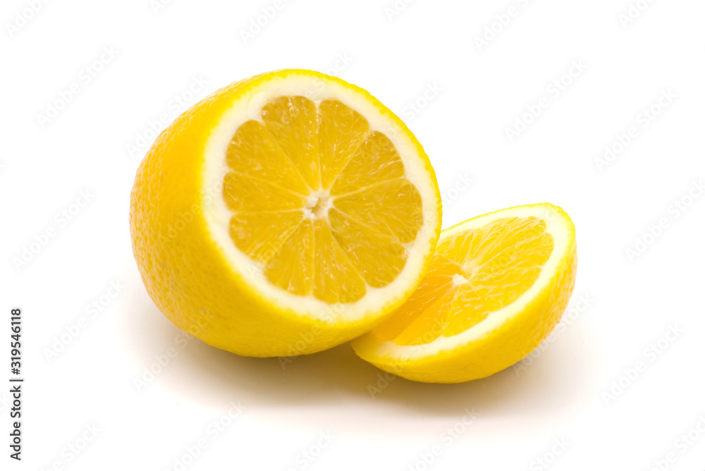 Bright juicy lemon and a slice of lemon on a white background Bright juicy lemon and a slice of lemon on a white background