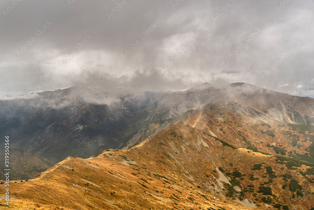 Beautiful autumn panorama landscape with a view of the Tatra Mountains