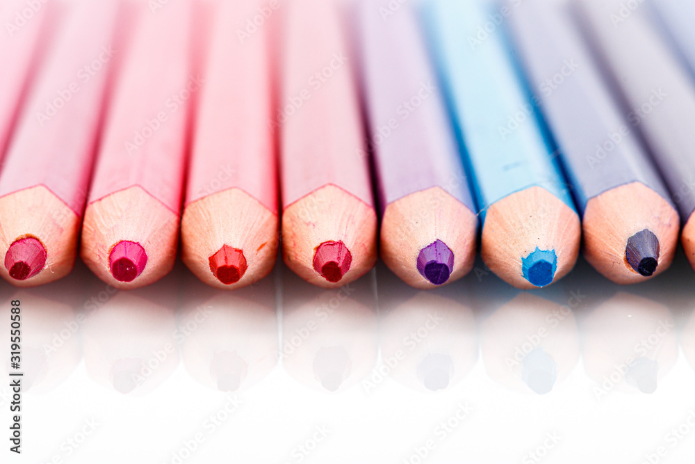 macro multicolored pencils on a white background macro multicolored pencils on a white background