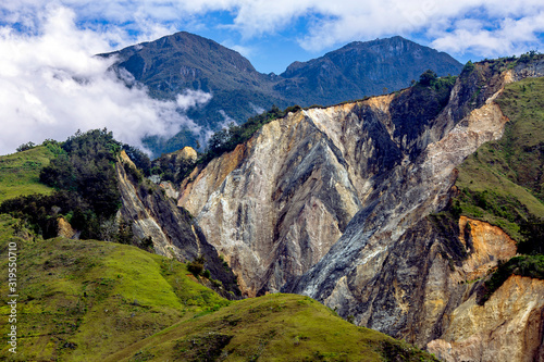 Great ridge of mountains with corrosion in Papua Province, New Guinea, Indonesia photo