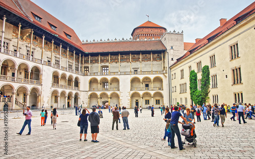 Krakow, Poland - May 1, 2014: People at inner courtyard of Wawel Castle, Krakow, Poland