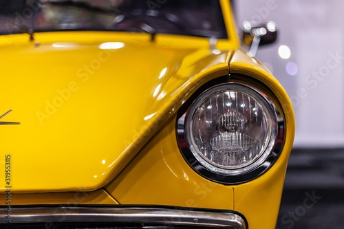 quirky interesting headlights on front of classic car