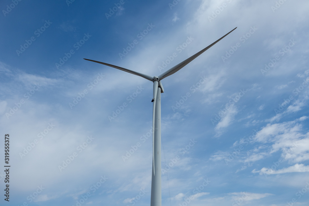 Rope access technicians working on a wind turbine blade Rope access technicians working on a wind turbine blade