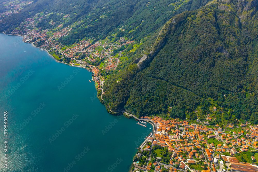 Lake Como Aerial View. Travel Postcard Concept. Coastline of Lago di Como With Many Villages.